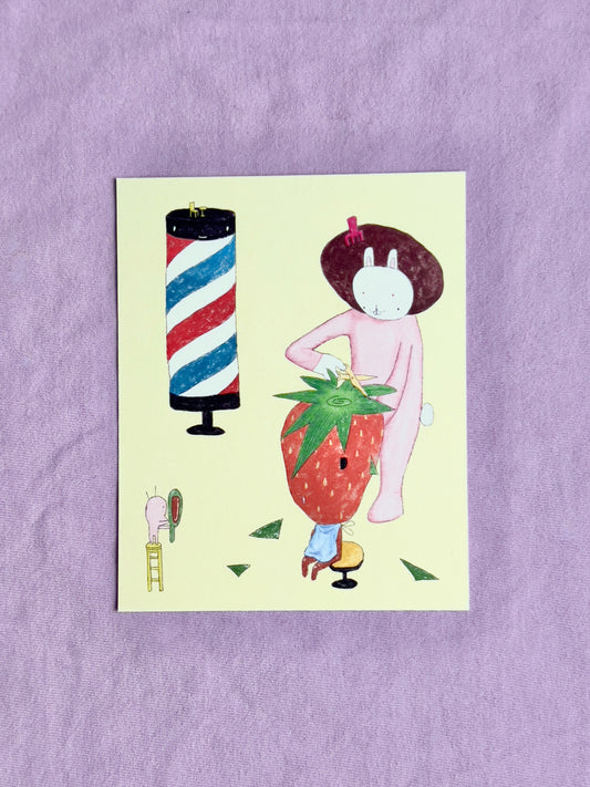A strawberry getting a haircut